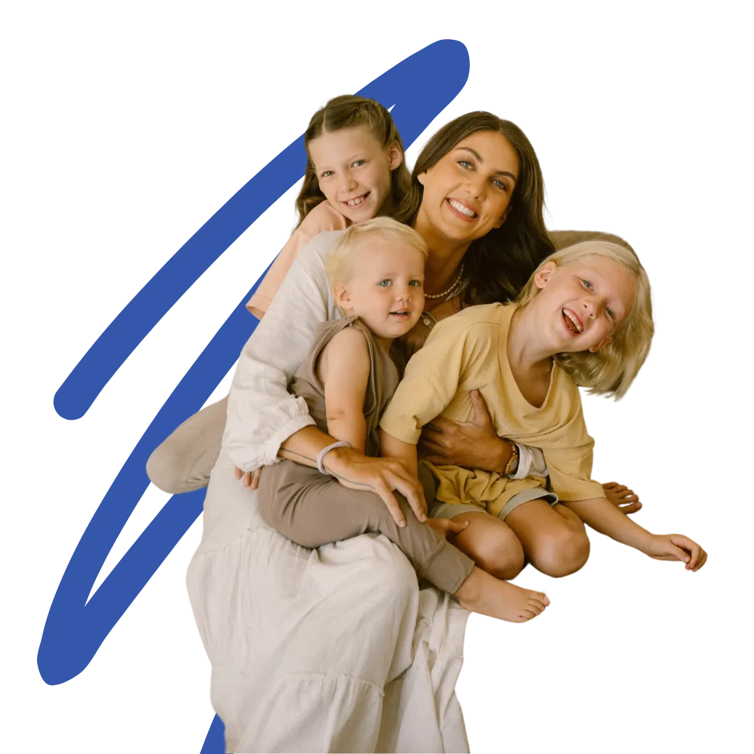Kristin hugging her three children, all smiling